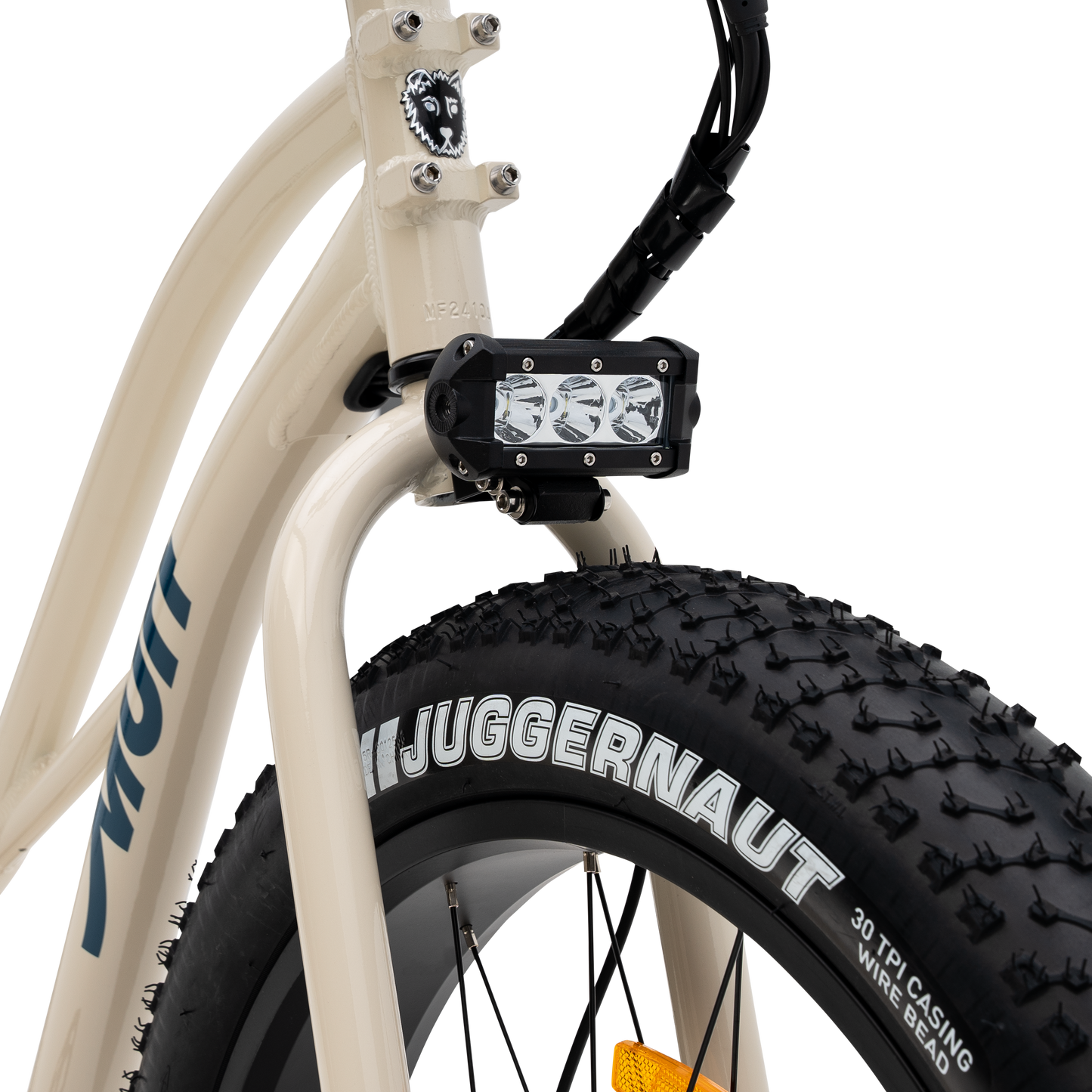 Close-up of a bicycle with The Fat Murf Step-Thru's rugged front led light fixture. 