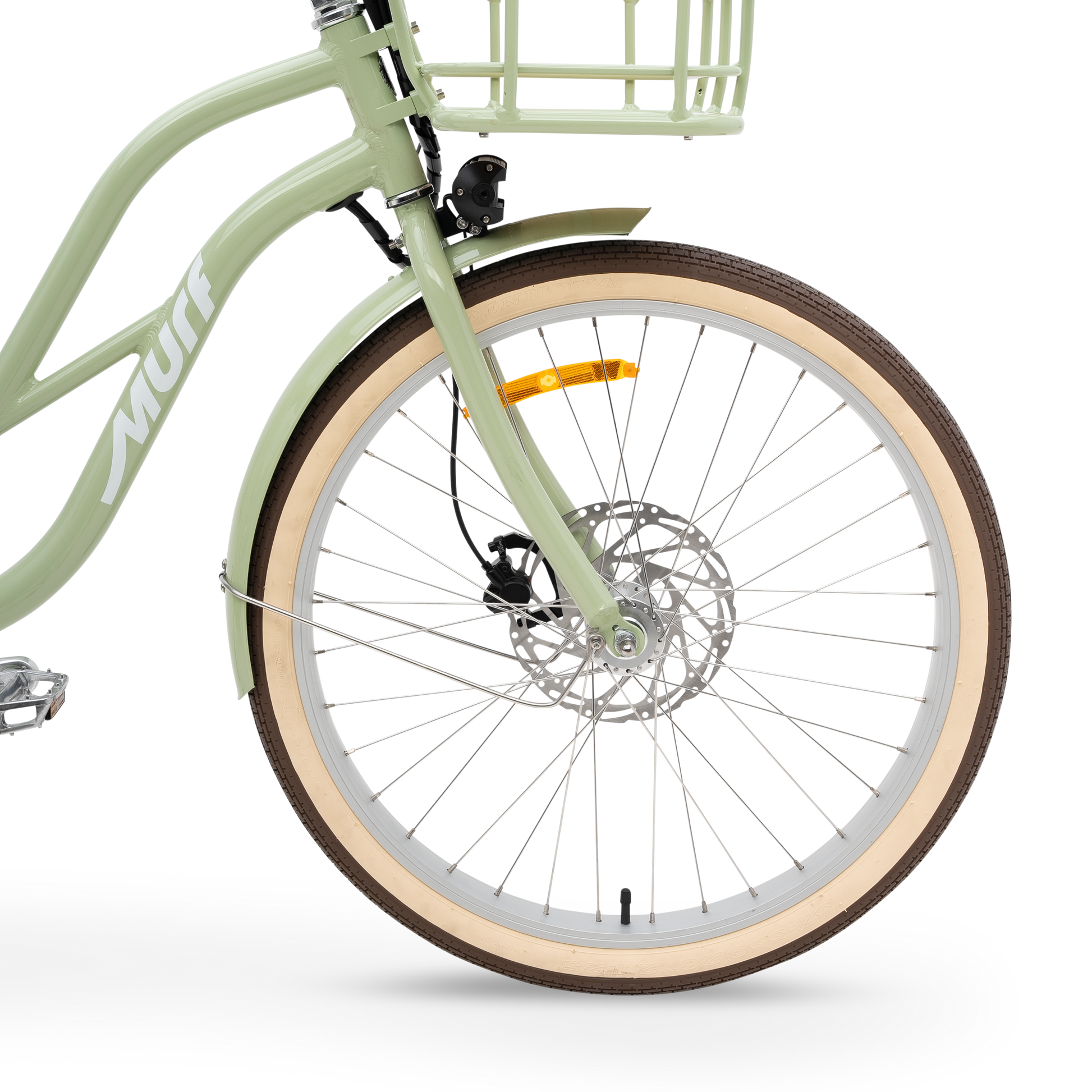 Close-up of The Gigi's front wheel, showing the Tektro hydraulic disc brakes and color-matched fender.