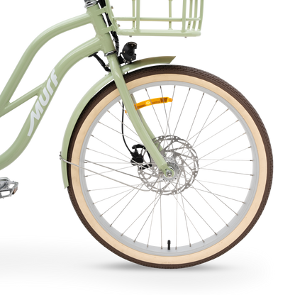 Close-up of The Gigi's front wheel, showing the Tektro hydraulic disc brakes and color-matched fender.
