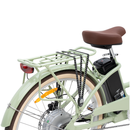 Detailed view of The Gigi's color-matched integrated rear rack, leather-inspired saddle, and tail light.