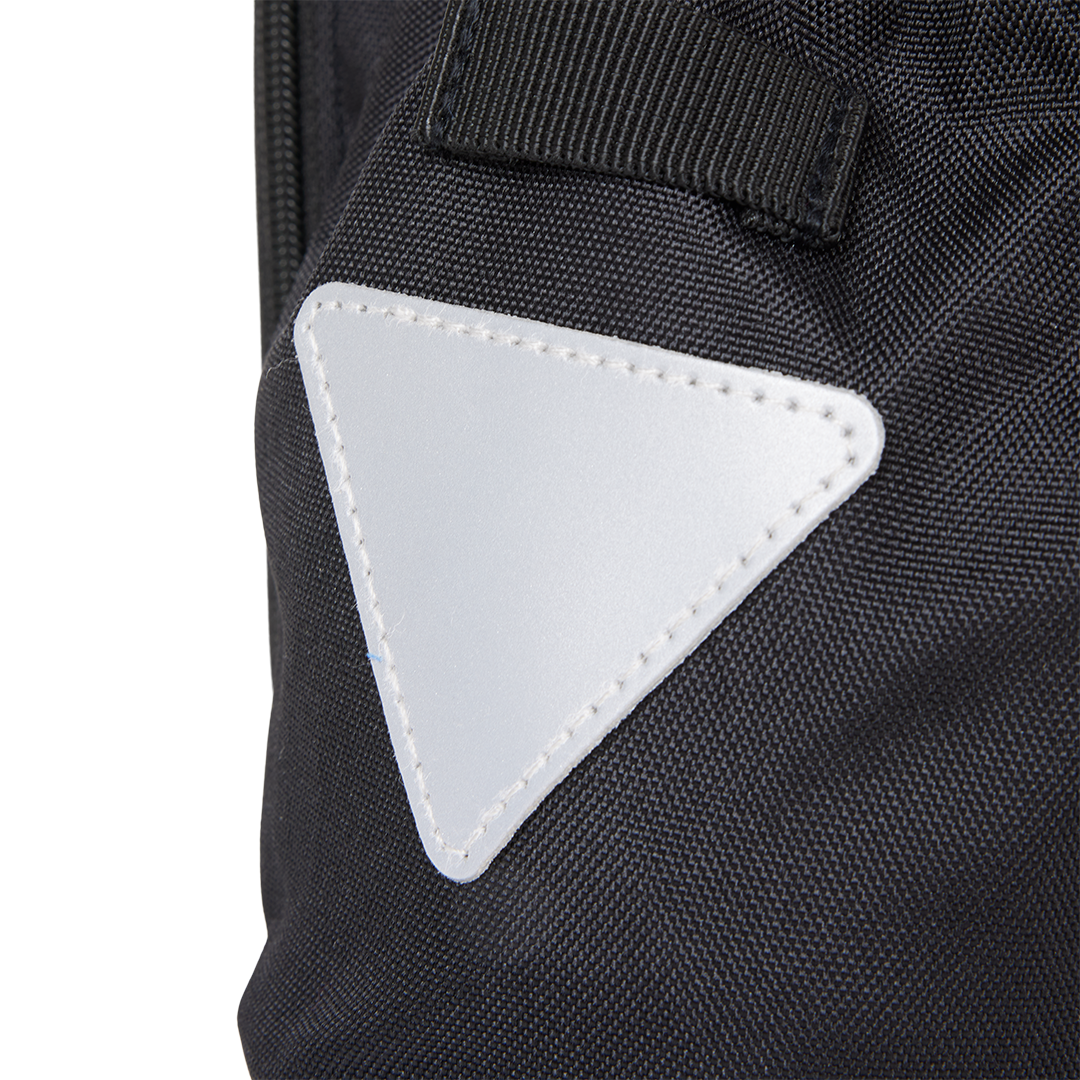 Close-up detail of the highly visible, stitched reflective safety triangle patch on the Murf Big Dawg Rack Bag.