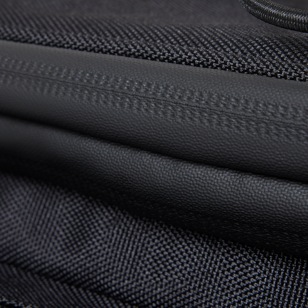 Extreme close-up of the Murf Big Dawg Rack Bag, detailing the durable, weatherproof fabric material and the sealed zipper seam.