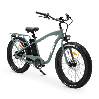 The Alpha Murf fat tire electric bike in Seabreeze Green, shown from the side in a studio view.