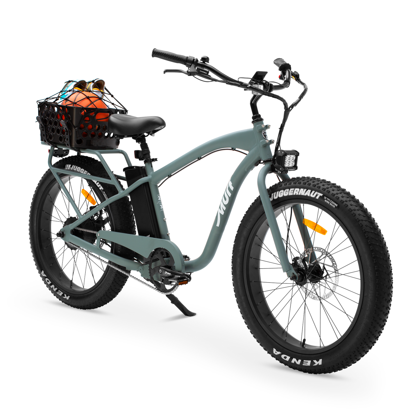 Sea Breeze Green electric bike with a basket filled with rear basket ball and pair of shoes on a white background