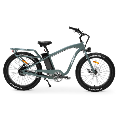 The Alpha Murf fat tire electric bike in Seabreeze Green, shown from the side in a studio view.