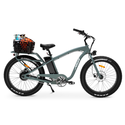 Sea Breeze colored Alpha Murf electric bike with a basket on a white background side shot