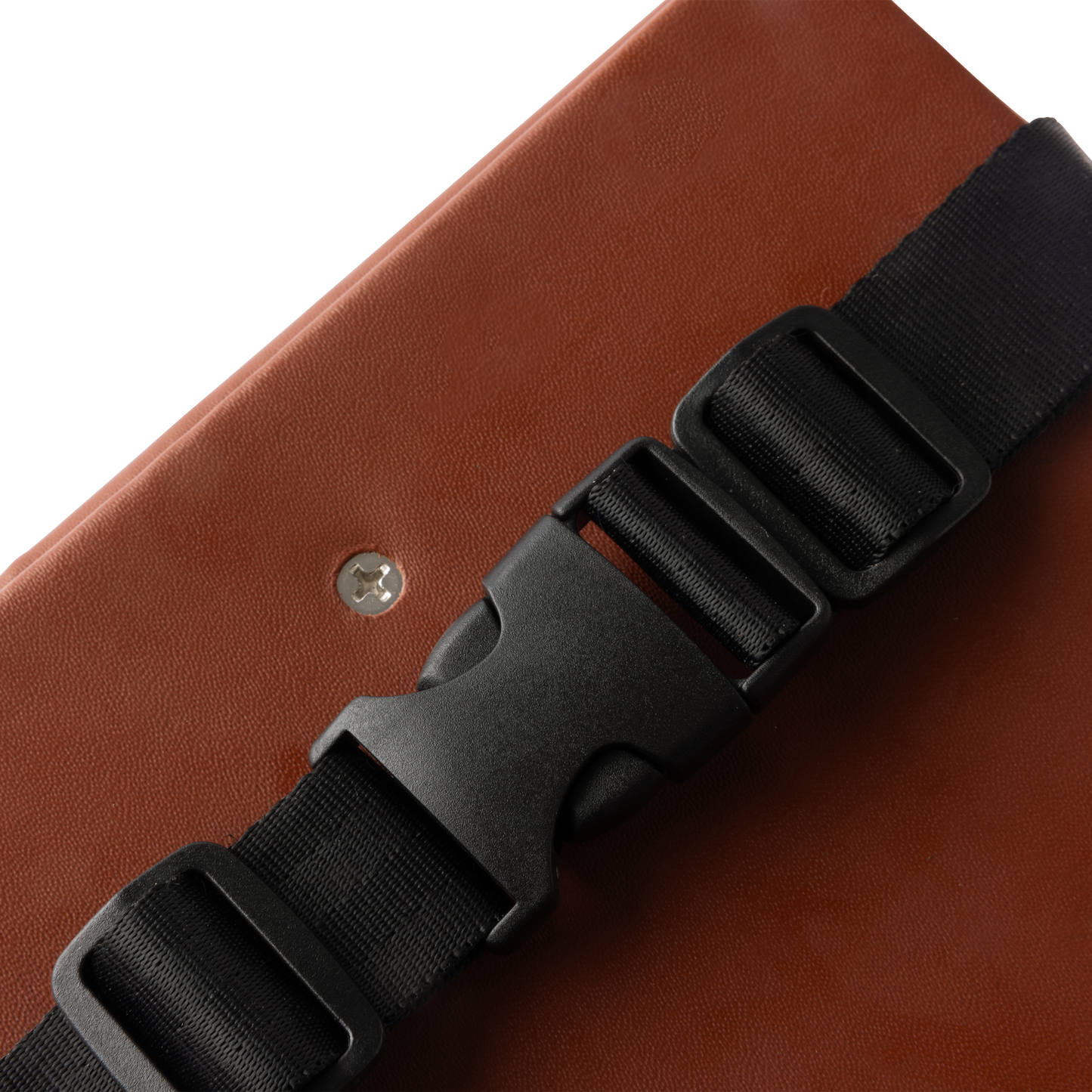 Close-up of the Murf Cargo Seat Pad, highlighting the brown synthetic leather texture and the black nylon quick release buckle clasp mechanism.
