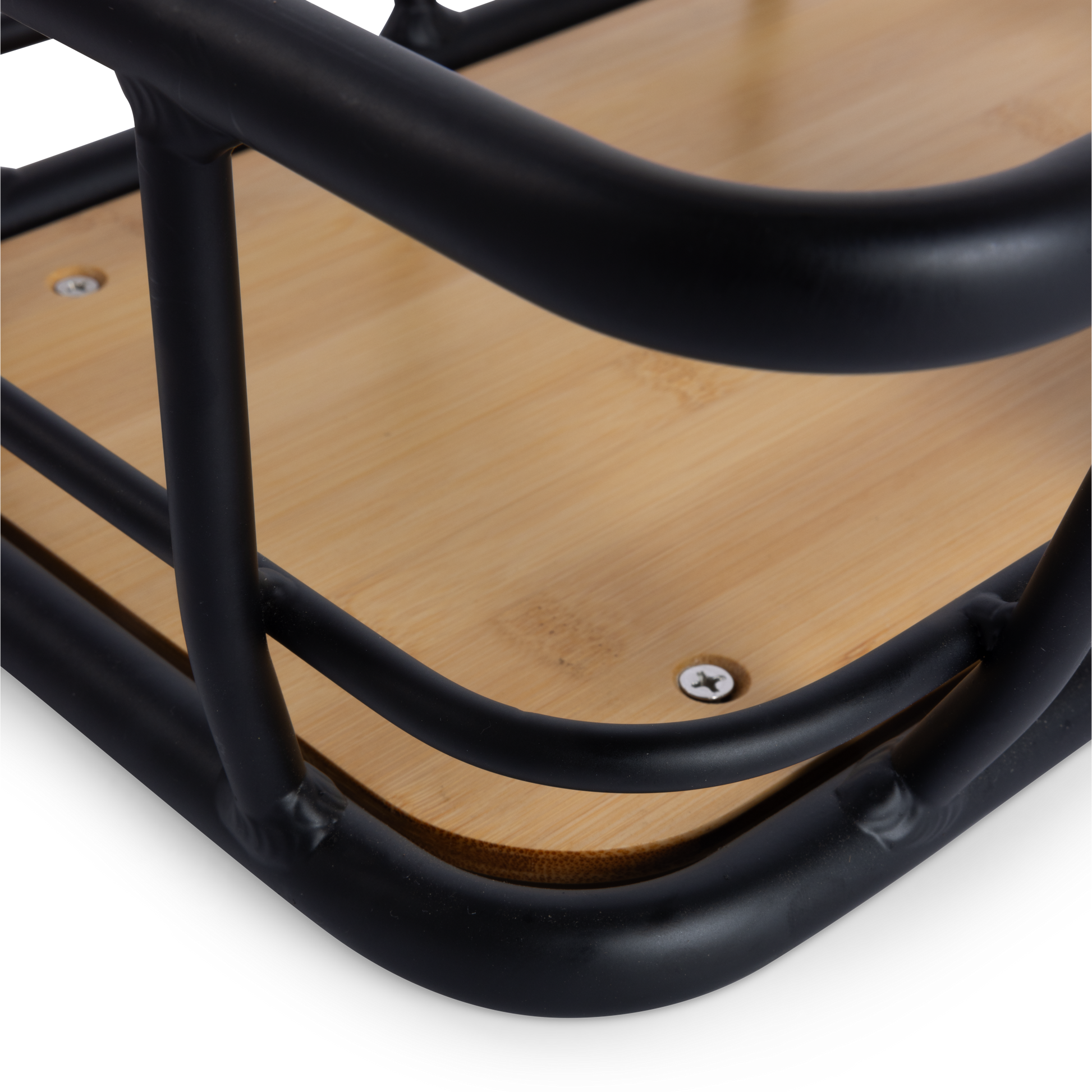 Close-up detail of the corner of the Murf Front Basket, highlighting the powder coated aluminum frame and the natural bamboo wood panel secured by screws.