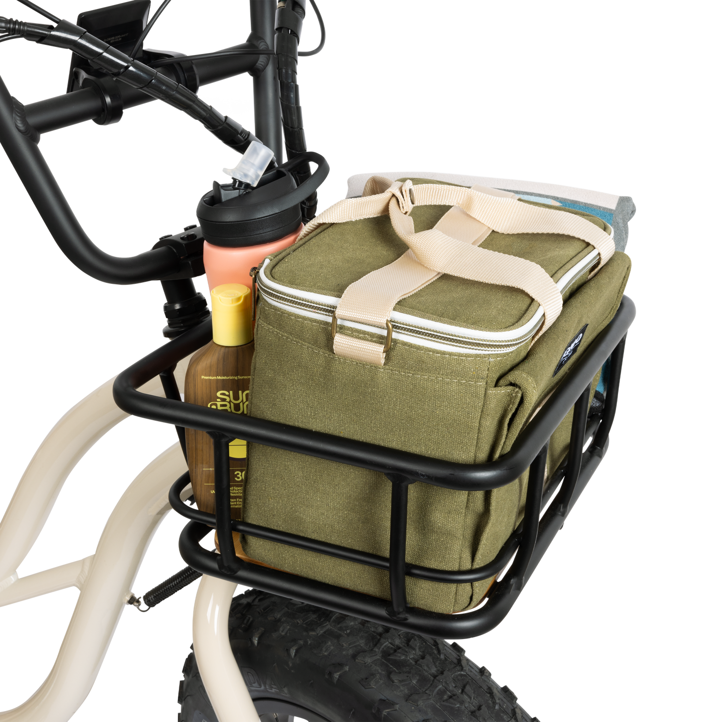 Front Basket mounted on a white e-bike and loaded with a cooler bag, water bottle, and sunscreen, demonstrating the ample cargo capacity for recreation and utility.