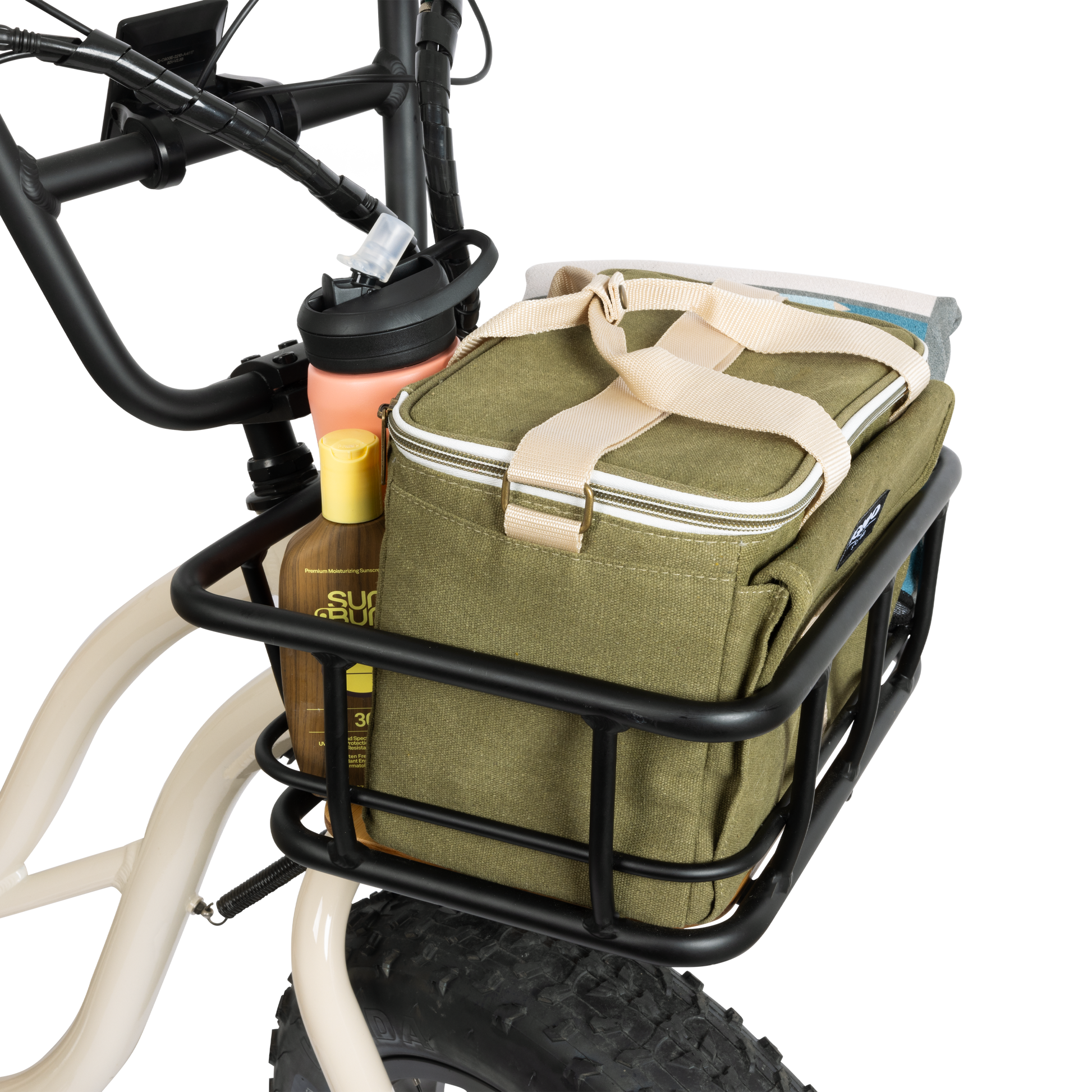 Front Basket mounted on a white e-bike and loaded with a cooler bag, water bottle, and sunscreen, demonstrating the ample cargo capacity for recreation and utility.