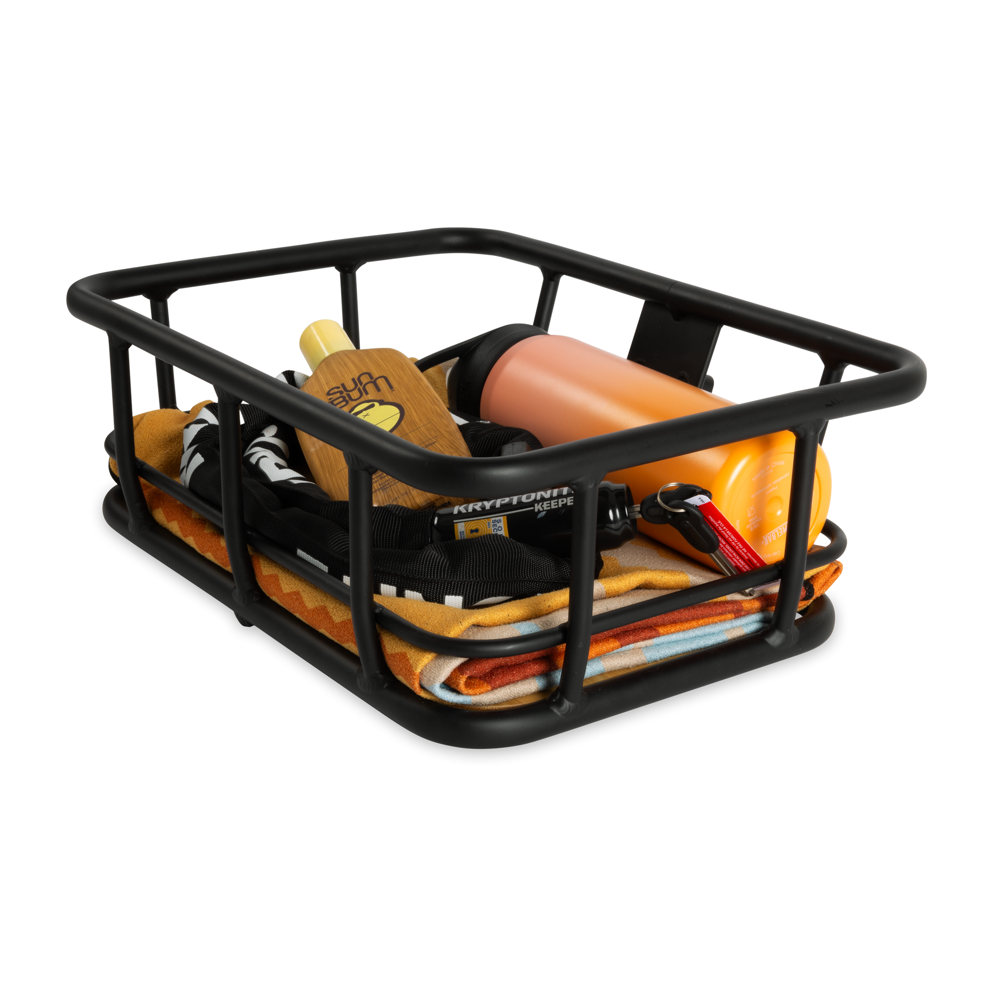 Murf Front Basket loaded with beach essentials including a towel, sunscreen, water bottle, keys, and a Kryptonite lock, demonstrating secure transport of small daily items.