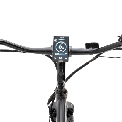 A close-up view of The Alpha ST's high-resolution color display and handlebar controls.