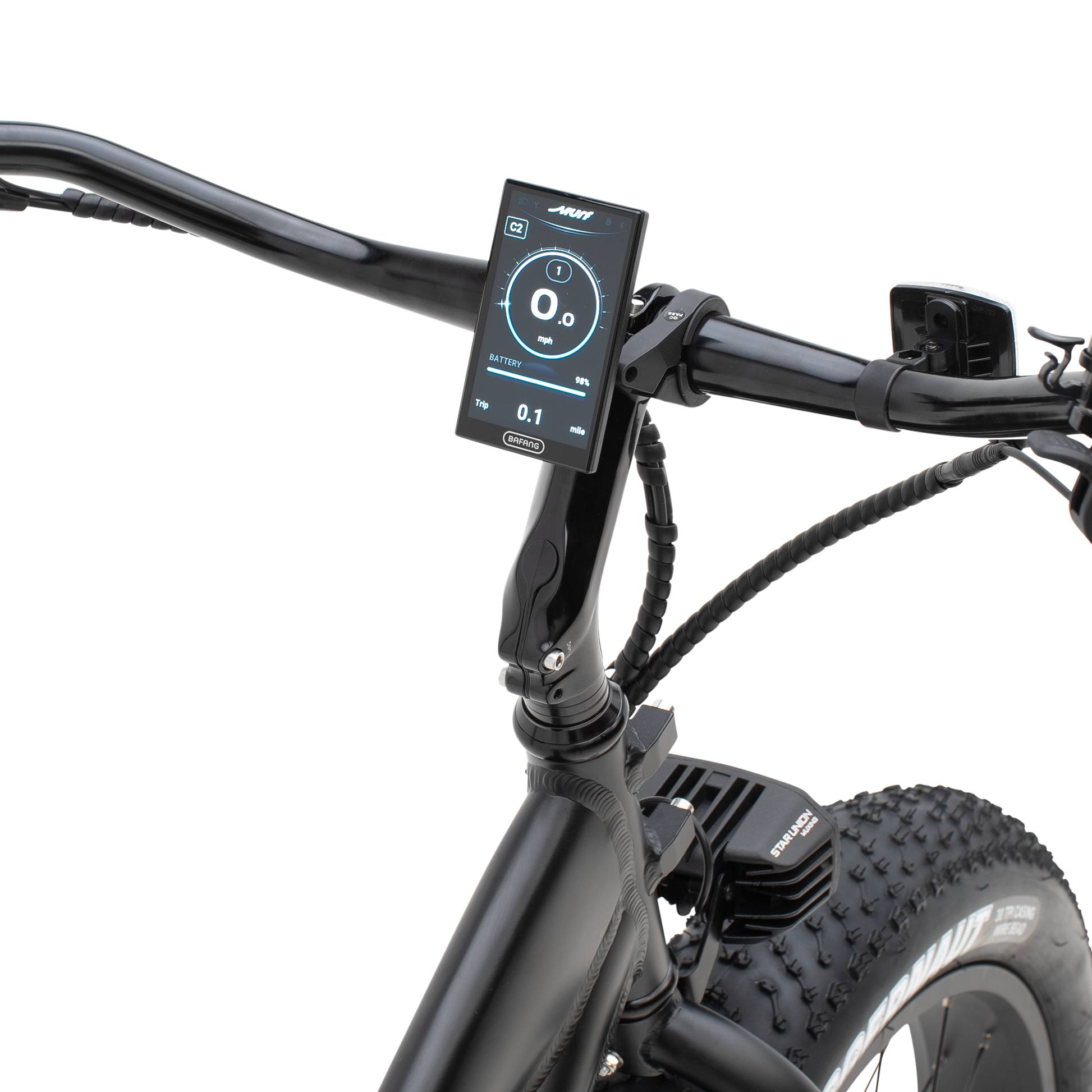 A close-up view of The Alpha ST's high-resolution color display and handlebar controls.