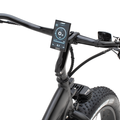 A close-up view of The Alpha ST's high-resolution color display and handlebar controls.