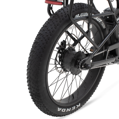 Close-up of The Alpha ST's 26-inch by 4-inch fat tire and 4-piston hydraulic brakes.