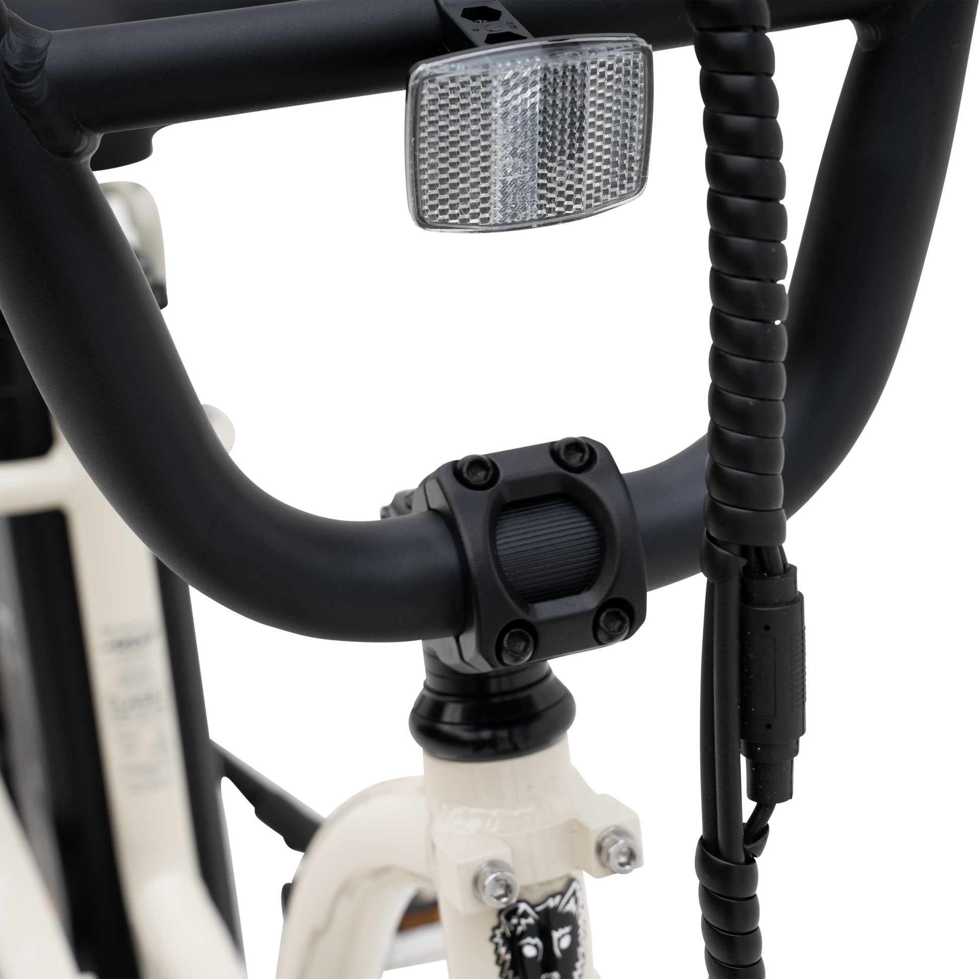Close-up of a Higgs Step-Thru handlebar showcasing promininet reflector and black grips on a bone white frame.