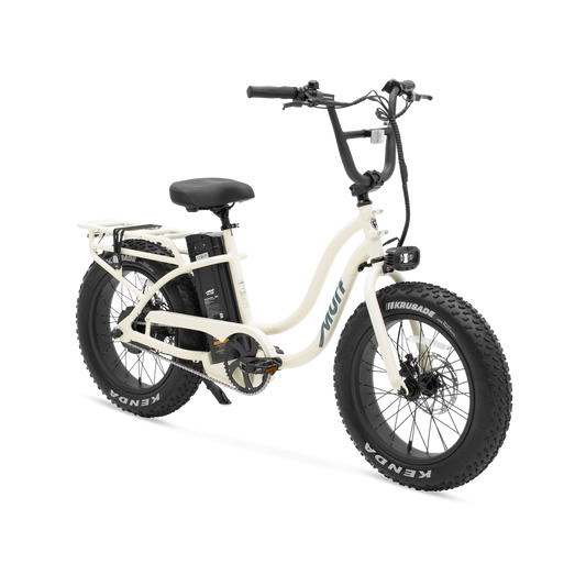 The Higgs ST step-thru fat tire e-bike in raw polished aluminum frame, shown from three quarter in a studio view.