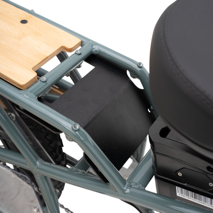 Close-up of the rear cargo platform and protectiveplate integrated with frame separating the rider seat from the rear platform with a wooden bamboo inlayed board 