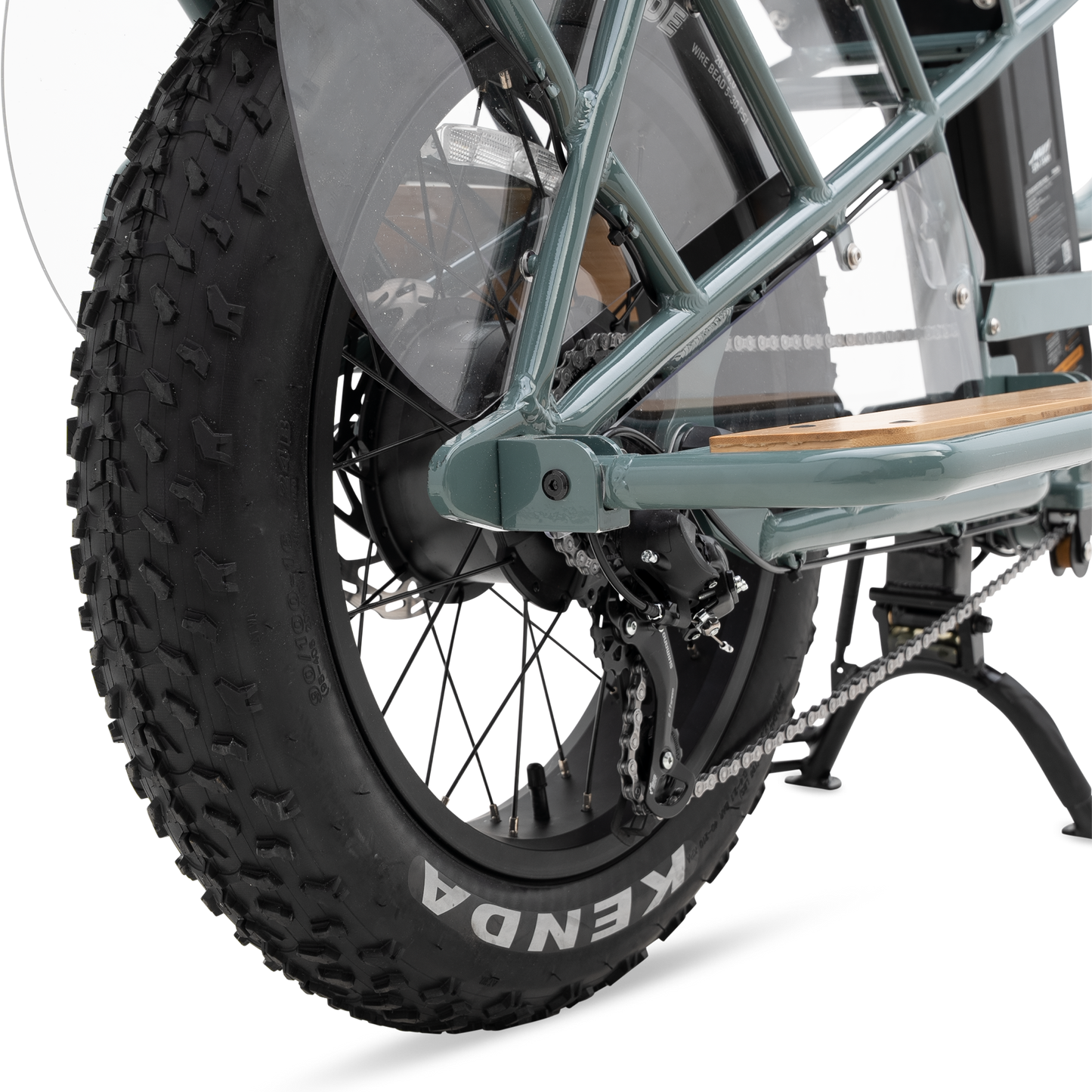 Protective wheel skirt and bamboo deck detail separating passenger from rear wheel