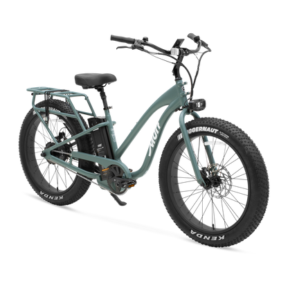 A three-quarters studio view of The Alpha ST step-thru e-bike in Seabreeze Green, highlighting its low-step frame and fat tires.